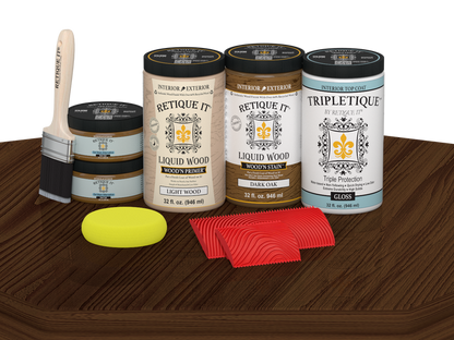 Retique It Wood'n Finish Kit with four large dark oak stain bottles and a gloss finish on a tabletop.