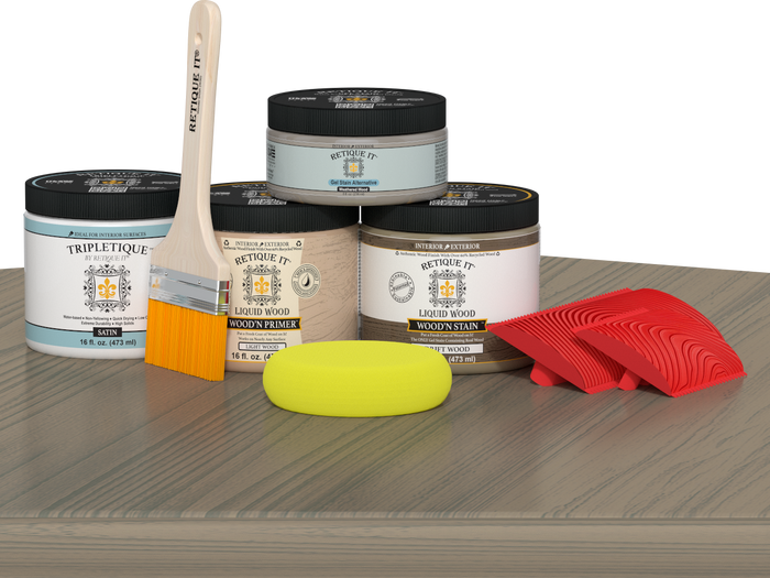 Retique It Wood'n Finish Kit in Drift Wood stain displayed on a table, showcasing a double-size stain kit for wood finishing projects.