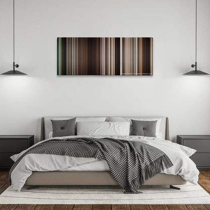 The Book of Eli color palette canvas above a bed, between two black pendant lamps