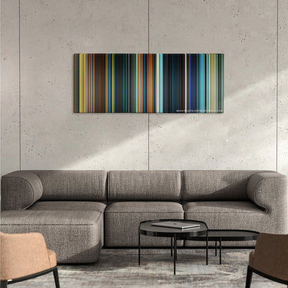 The Lord of the Rings: The Fellowship of the Ring color palette canvas on a concrete wall above a gray sectional sofa