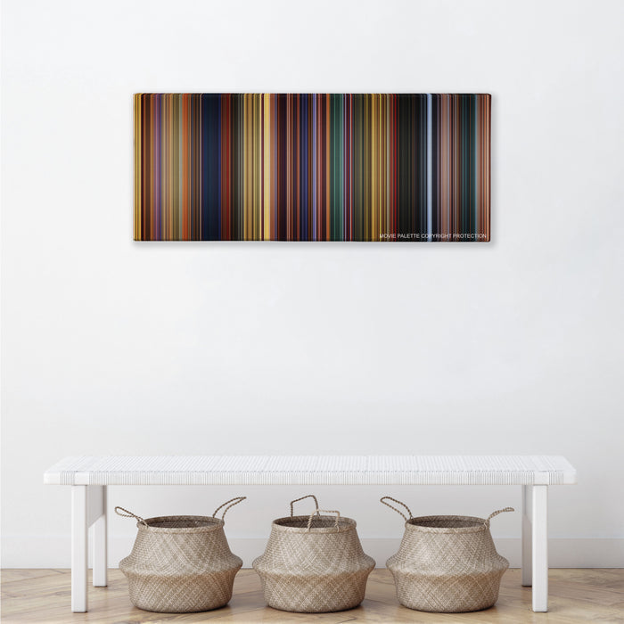 The Prince of Egypt color palette canvas above a white bench with three woven baskets