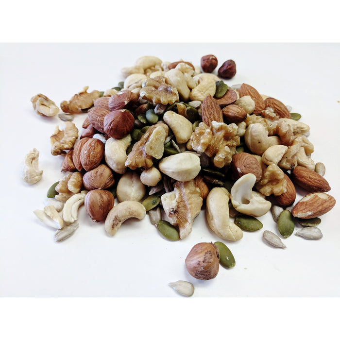 Totally Raw Trail Mix includes: Raw Large Cashew Pieces, Raw Shelled (out of shell) Sunflower Seeds, Raw Pepitas (out of shell pumpkin seeds), Raw Natural Almonds, Raw Walnuts &amp; Raw Oregon Filberts