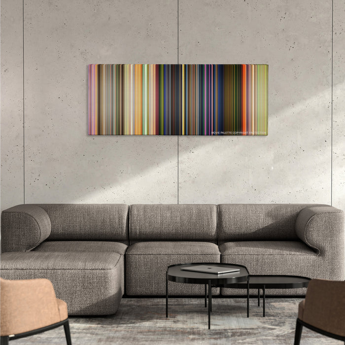 Toy Story 3 color palette canvas on a concrete wall above a gray sectional sofa