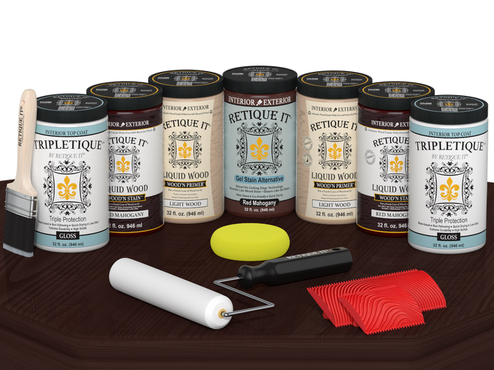 Retique It Wood'n Cabinet Kit with 24 red mahogany stained cabinet doors, glossy finish, displayed on a table.