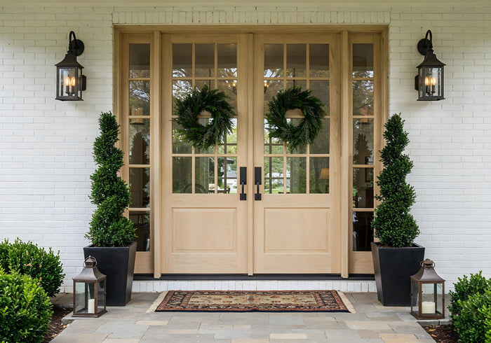Retique It Wood'n Finish Kits front door with double wooden panels, showcasing natural wood finish and craftsmanship.