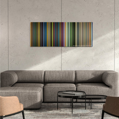 X-Men: Apocalypse color palette canvas on a concrete wall above a gray sectional sofa